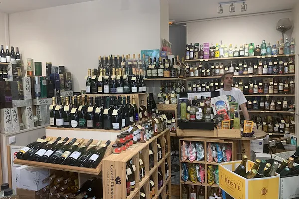 Le Raisin Bleu - Caviste Paris 13 / Vins / Champagnes / Spiritueux / Vins Bio / Cave à vins, Caviste à Paris — Cabinet